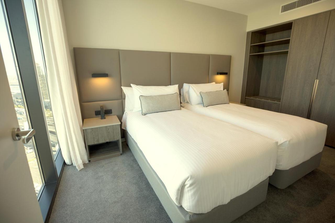 Oakwood Premier Melbourne Apart otel Dış mekan fotoğraf A bedroom at the hotel